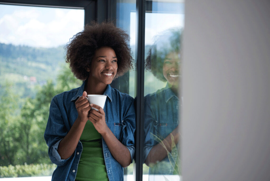 Woman looking out window